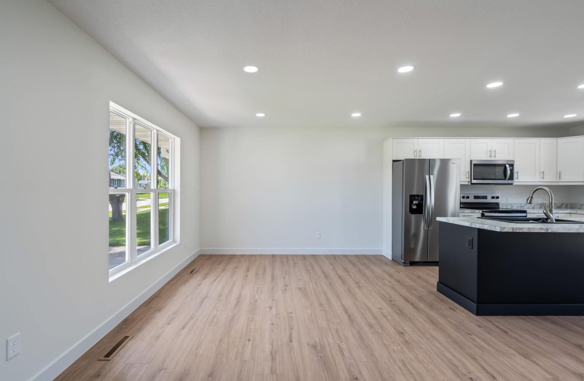 Finished living room with new drywall and trim
